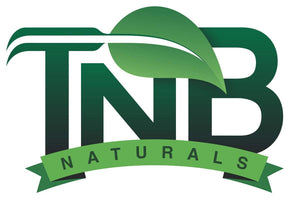 TNB Naturals white banner with green leaf logo on durable tarp material